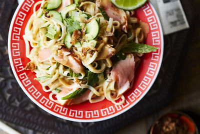 Sesame noodles with salmon and Asian herbs