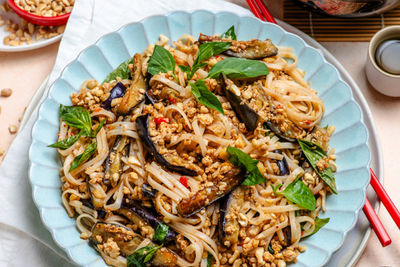 Thai Basil Chicken & Eggplant Noodle Bowl