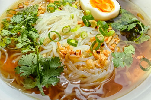 Chicken Broth Rice Noodle Soup, Garlic Oil, Mint and a Boiled Egg