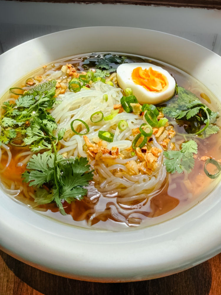 Chicken Broth Rice Noodle Soup, Garlic Oil, Mint and a Boiled Egg