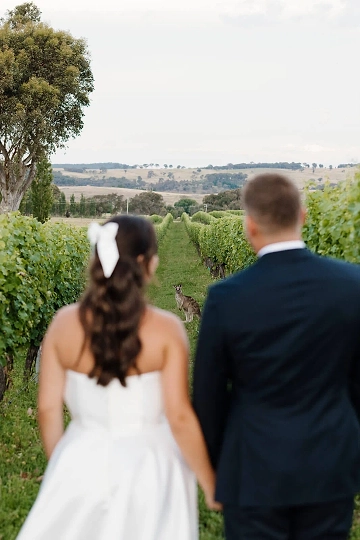 A couple enjoying the views and wildlife at Mayfield Vineyard.