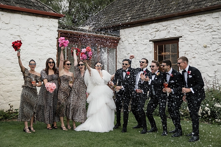 champagne spray with the wedding party at Emu Bottom Homestead