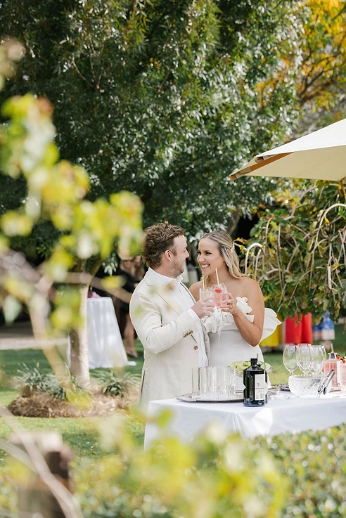 A couple enjoying a drink at Blue Wren Farm in Mudgee