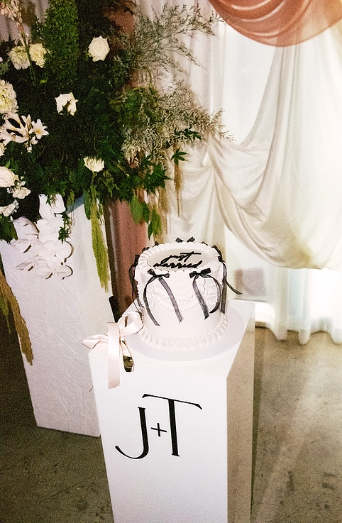 black and white wedding cake at Blue Wren Farm in Mudgee
