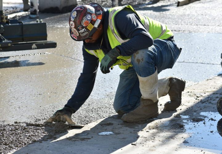 Weigand concrete finisher smoothing freshly poured concrete