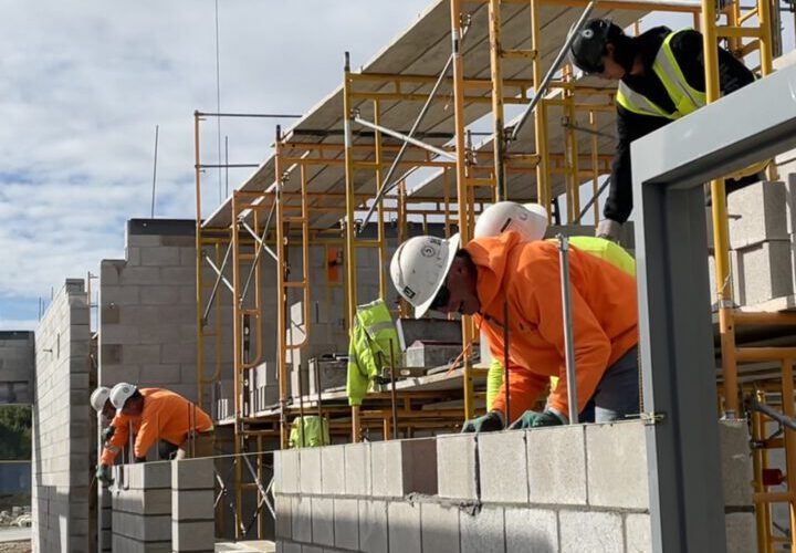 Weigand masons building a block wall