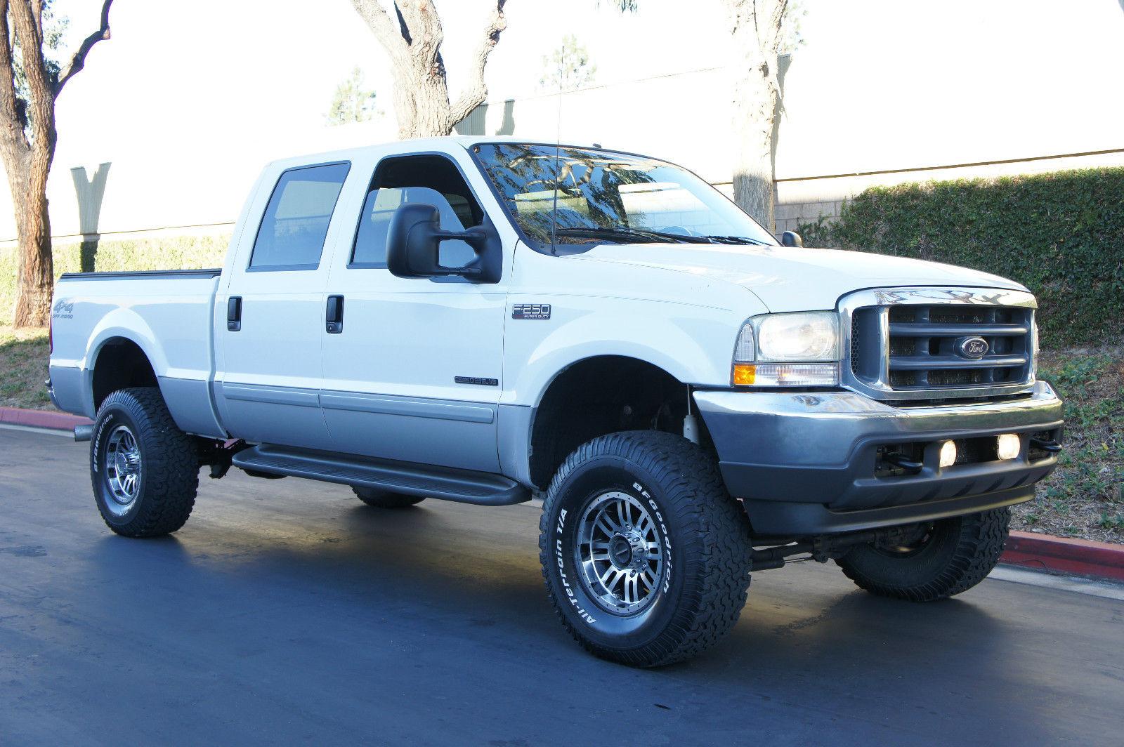 2002 FORD F 250 XLT 7.3L Powerstroke Turbo Diesel Lifted trucks for sale