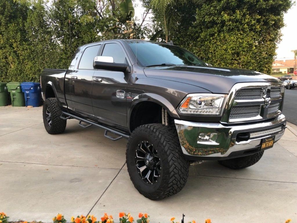 low miles 2015 Ram 3500 Laramie Longhorn lifted @ Lifted trucks for sale