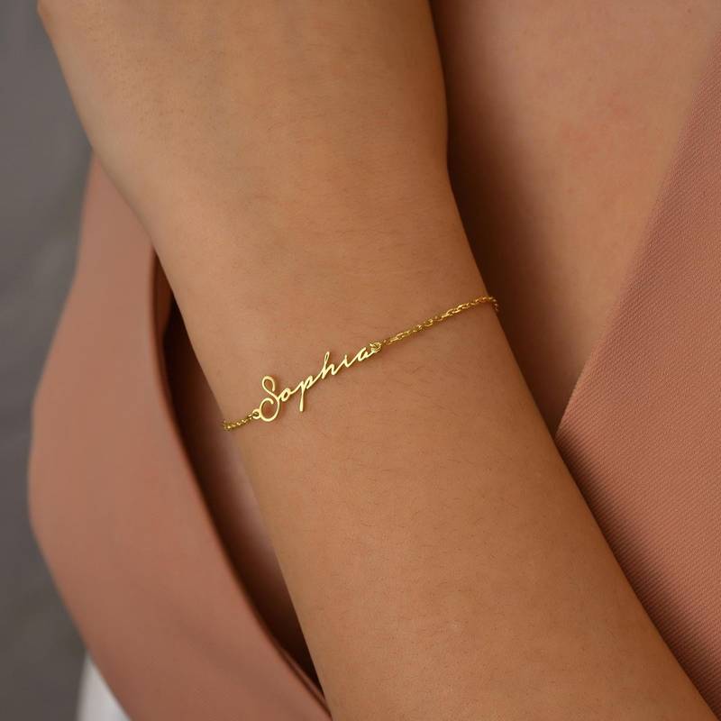 Thin Gold Chain Bracelet With Script Name Centerpiece - 1