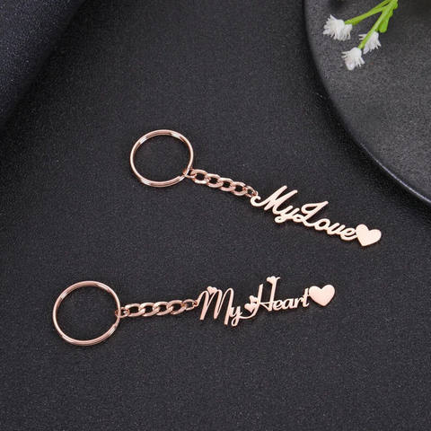 Phrase Keychain With Small Heart Accents On Edges