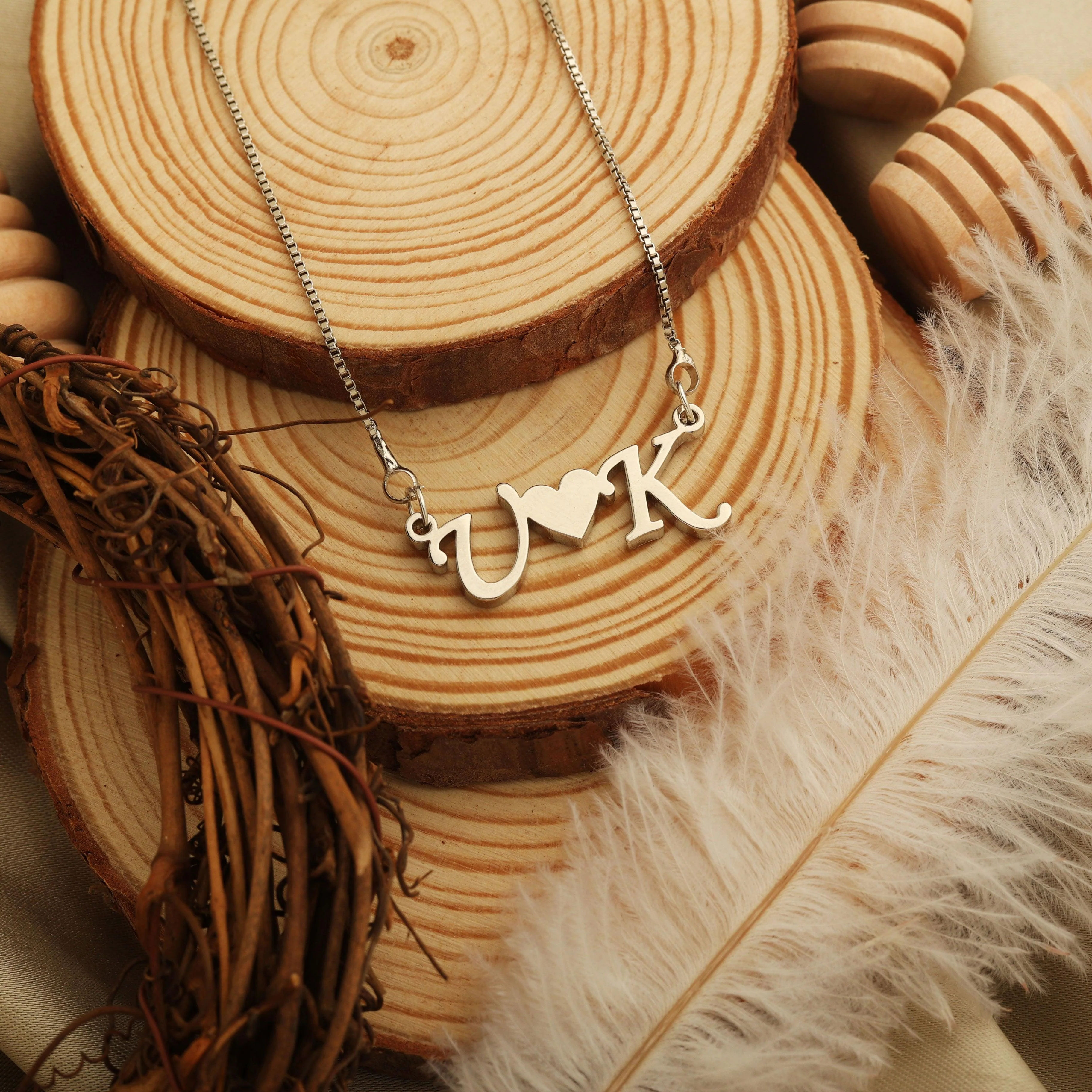 Initial Necklace With Heart Center Between Two Letters thumbnail 2