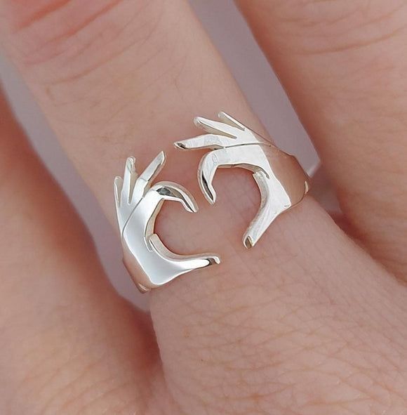 The Devotion Gesture Ring - Image 1