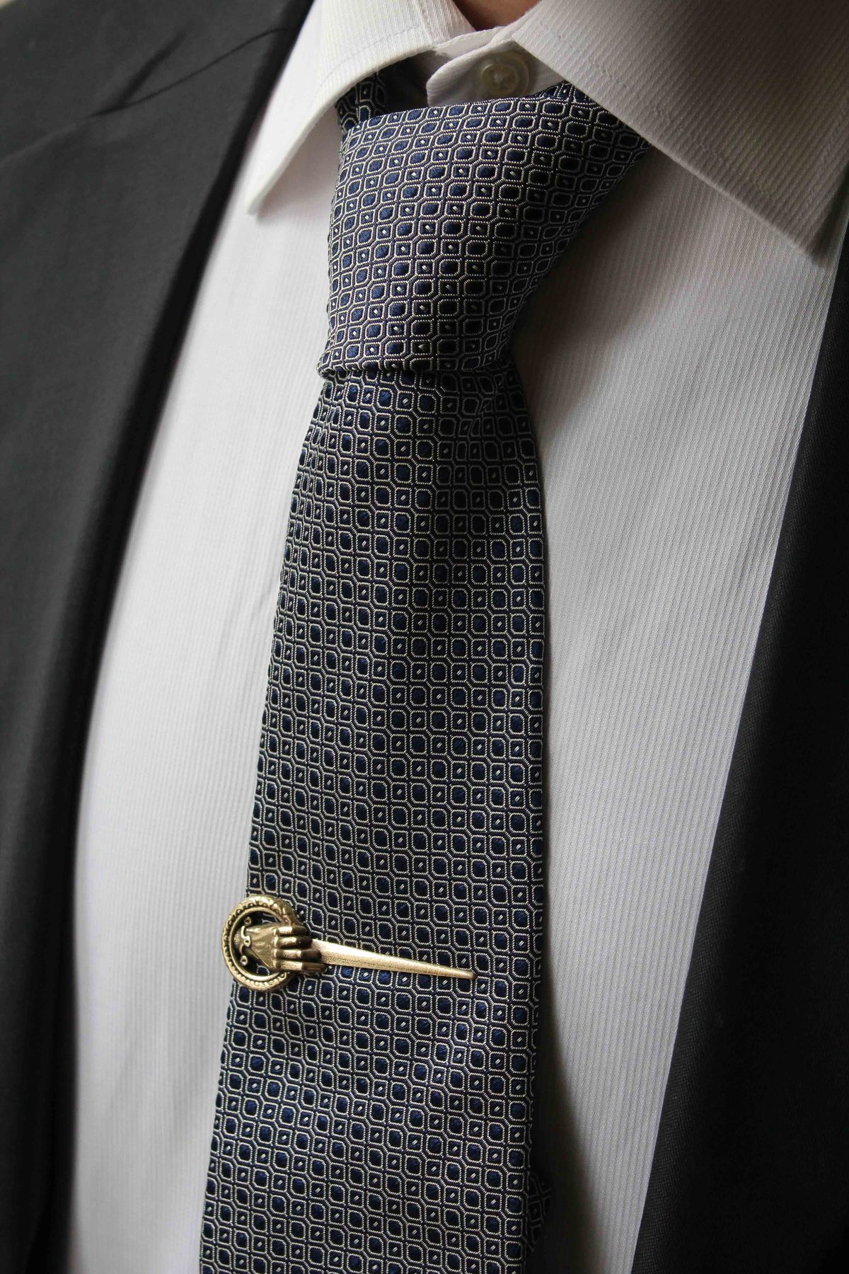 The Sovereign Counsel Tie Bar – Antiqued Bronze Hand & Ring Silhouette Clip