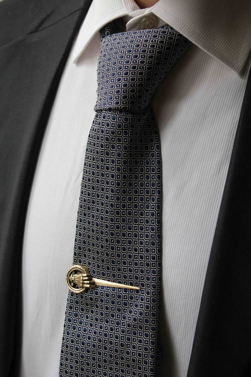 The Sovereign Counsel Tie Bar – Antiqued Bronze Hand & Ring Silhouette Clip - 1