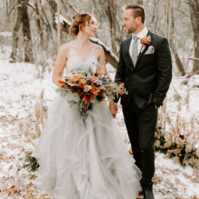 Bride holding Flowers wearing a Gown Bride holding Flowers wearing a Gown