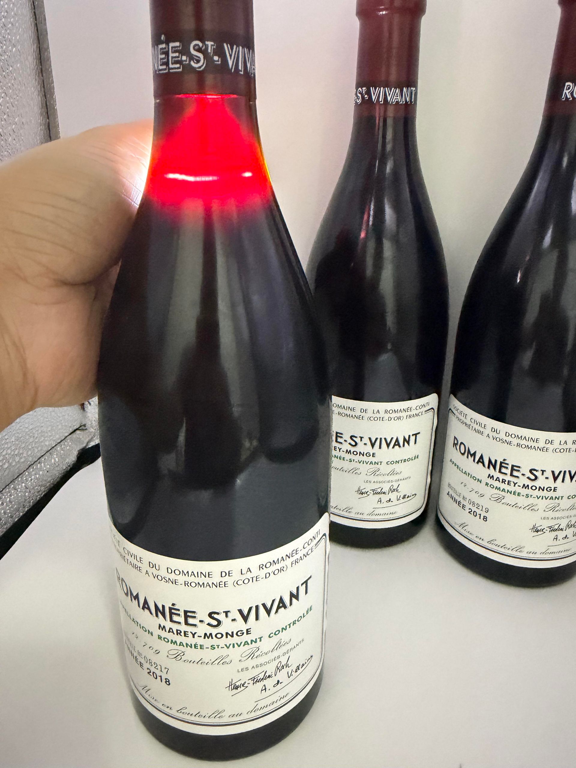 DRC RSV 單瓶、原木箱資料與已遮個人資料的購入憑證