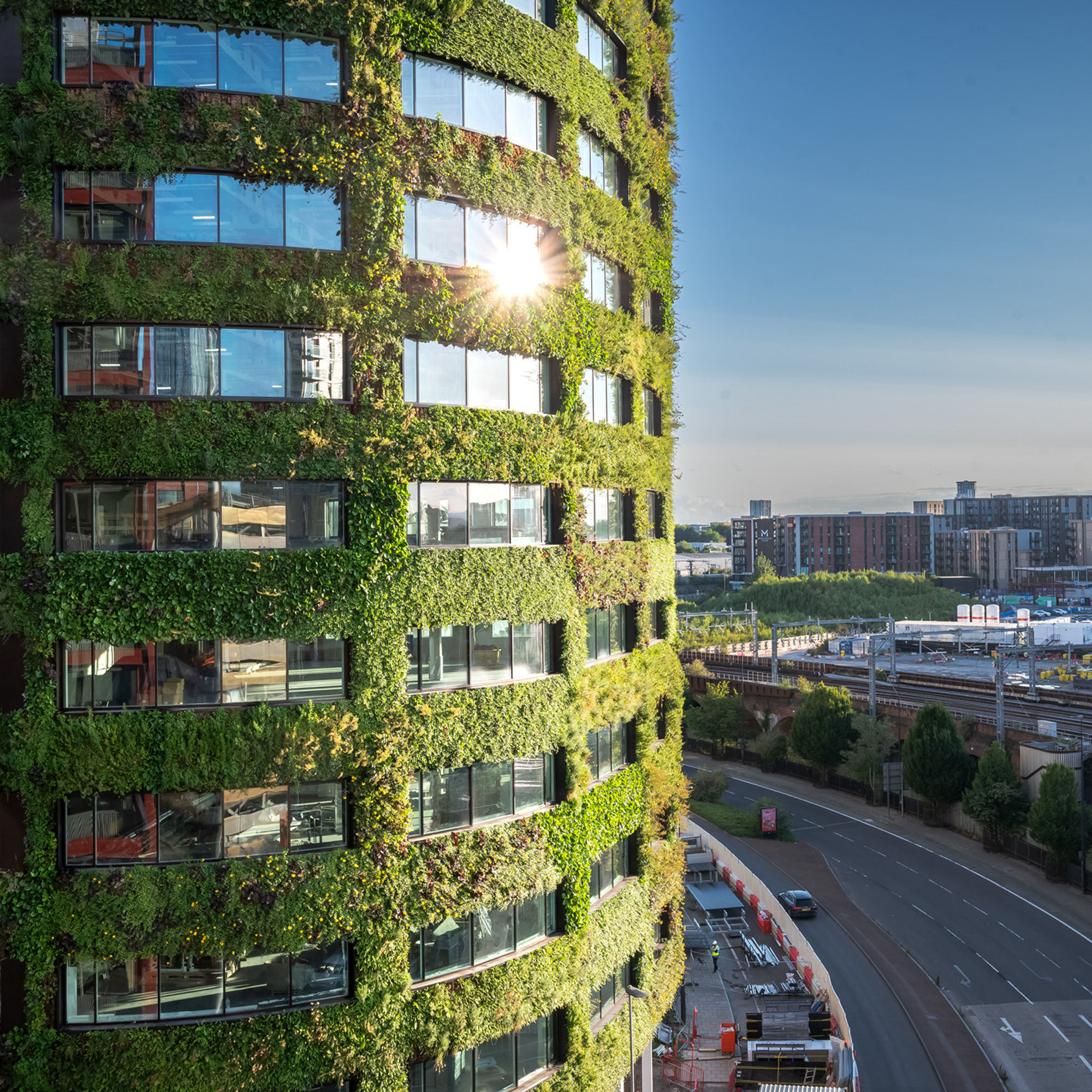 An image of Eden New Bailey on the left and a view of other parts of Salford on the right