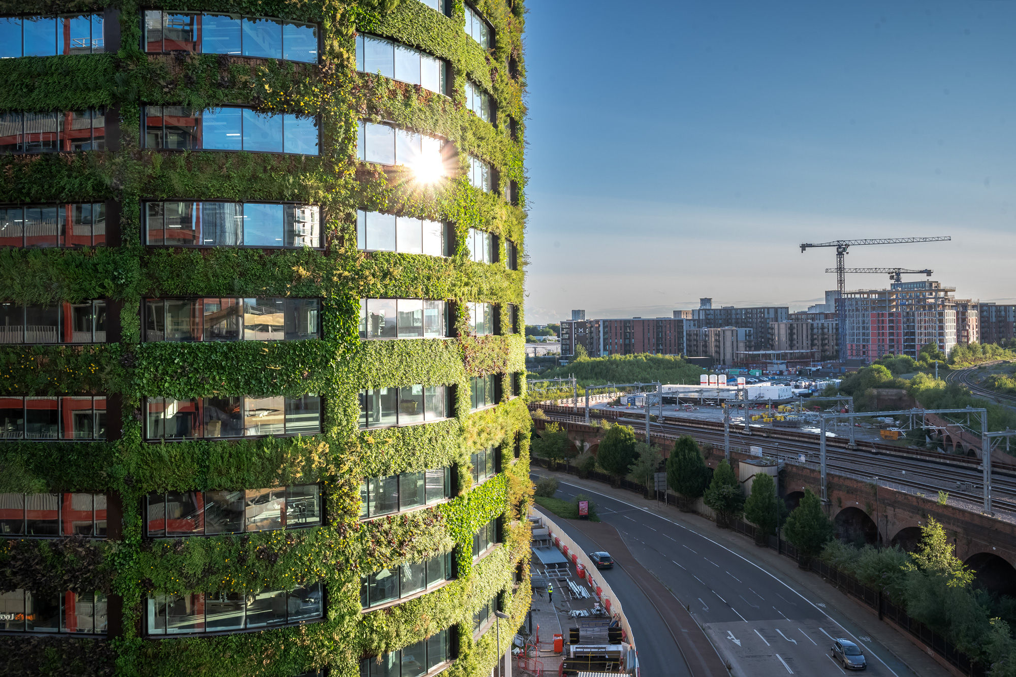 An image of Eden New Bailey on the left and a view of other parts of Salford on the right