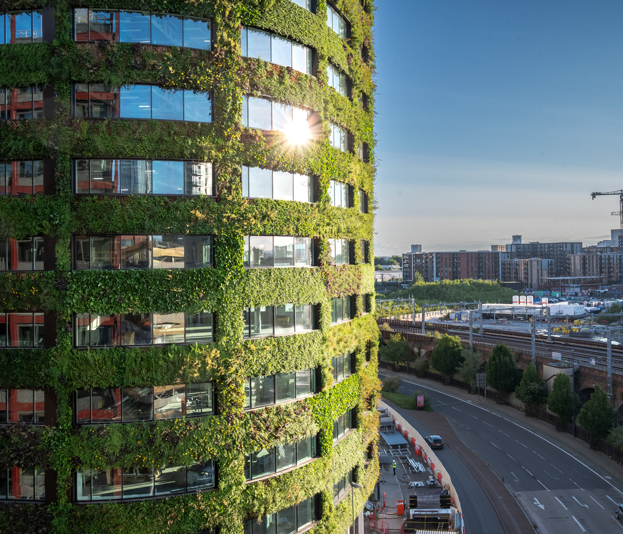 An image of Eden New Bailey on the left and a view of other parts of Salford on the right