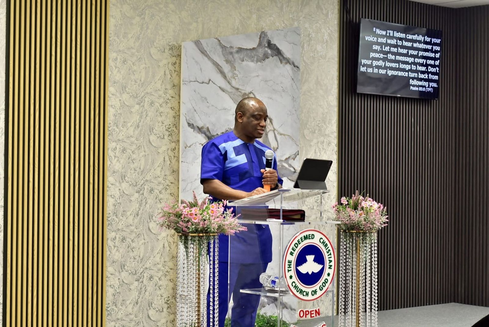 Our pastor leading the weekly confession