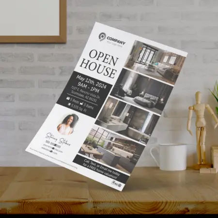 Real estate flyers promoting an open house event.