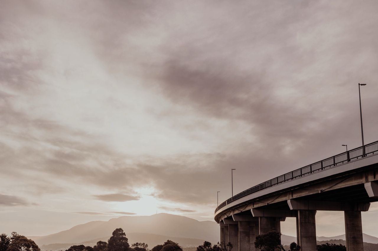 View of kunanyi/Mount Wellington from the Eastern Shore of Hobart with Tasman Bridge in the foreground ⌘