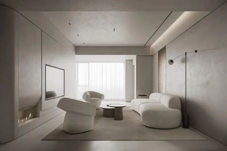 This may contain: a living room filled with white furniture and a fire place next to a large window