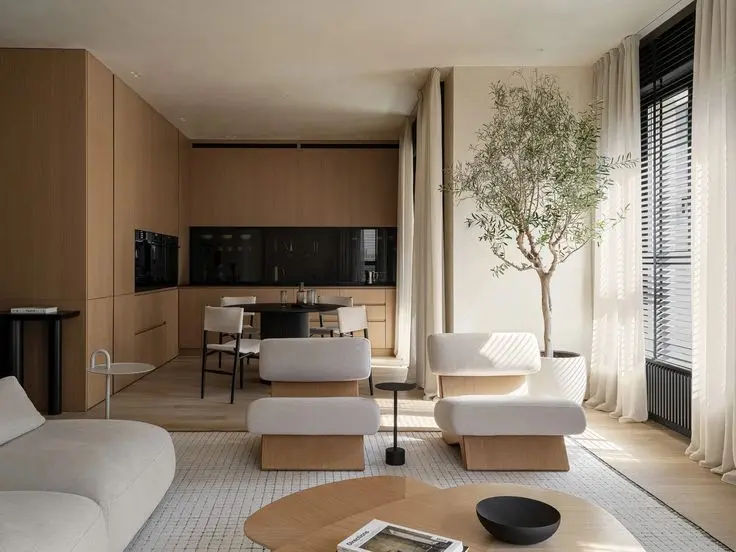 This may contain: a living room filled with furniture and a tree