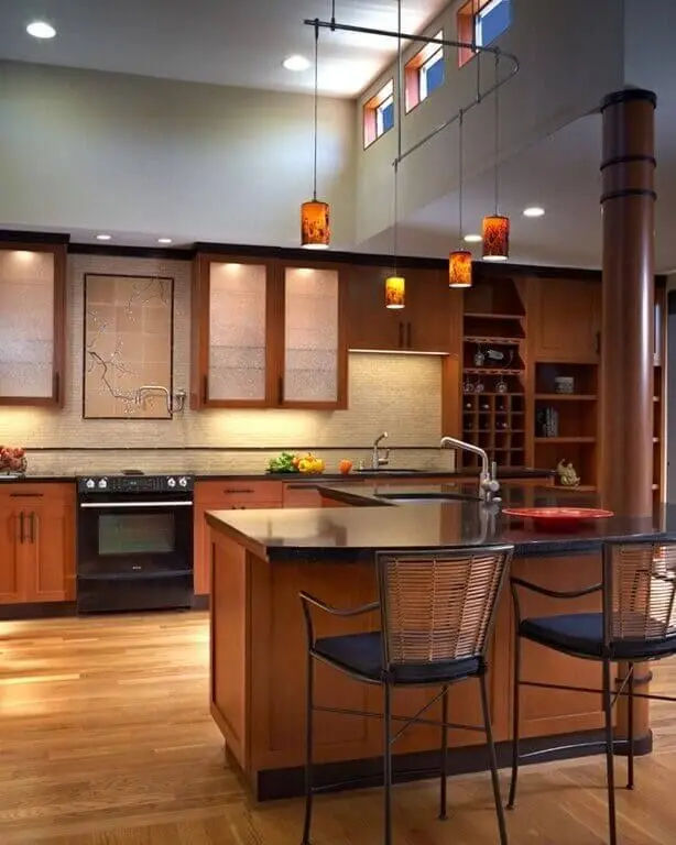 This may contain: a kitchen with wooden cabinets and an island in the center, surrounded by two bar stools
