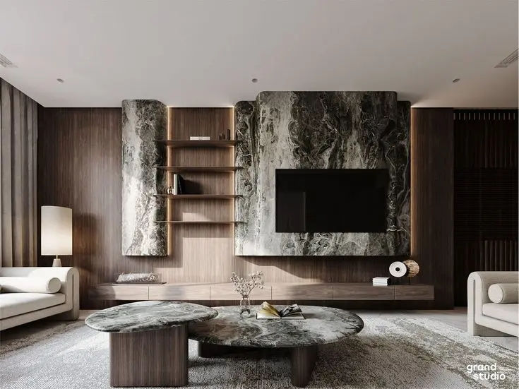 This may contain: a modern living room with marble walls and furniture in the center, along with a large tv mounted to the wall