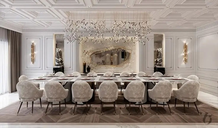 This may contain: an elegant dining room with white chairs and chandelier