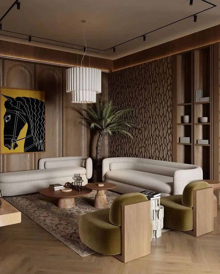 This may contain: a living room filled with furniture and a large painting on the wall behind two couches