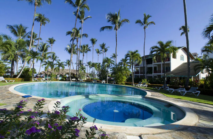 Aerial panoramic view of Hotel Playa Colibri beachfront resort in Las Terrenas with swimming pool