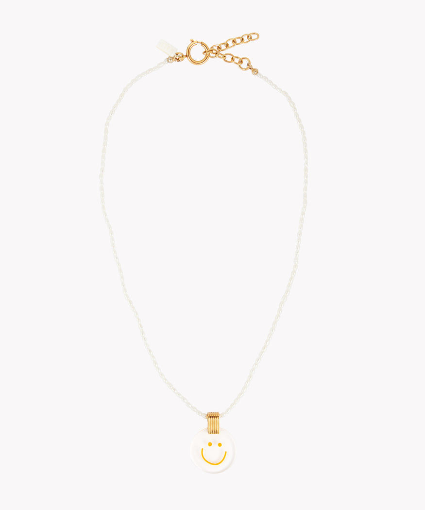 A gold-plated pendant necklace with a white pearl from the brand 