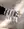 A woman is holding a pair of WALD Berlin Baroque Pearl White Headband.