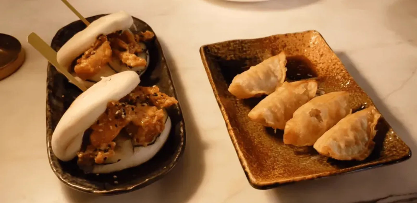 sea salt, crispy pork gyoza, fluffy bao buns stuffed with fried chicken