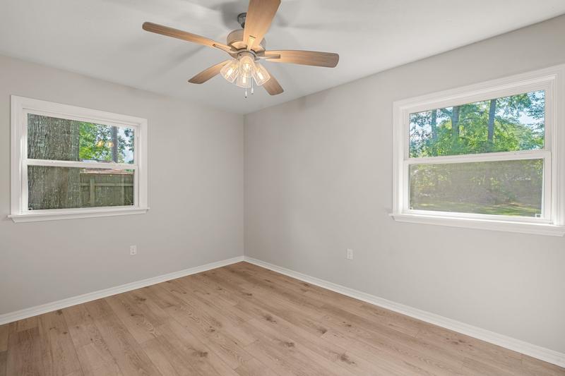 Bedroom with two windows and ceiling fan, 111 Springhill Drive, Westover, Hattiesburg, MS