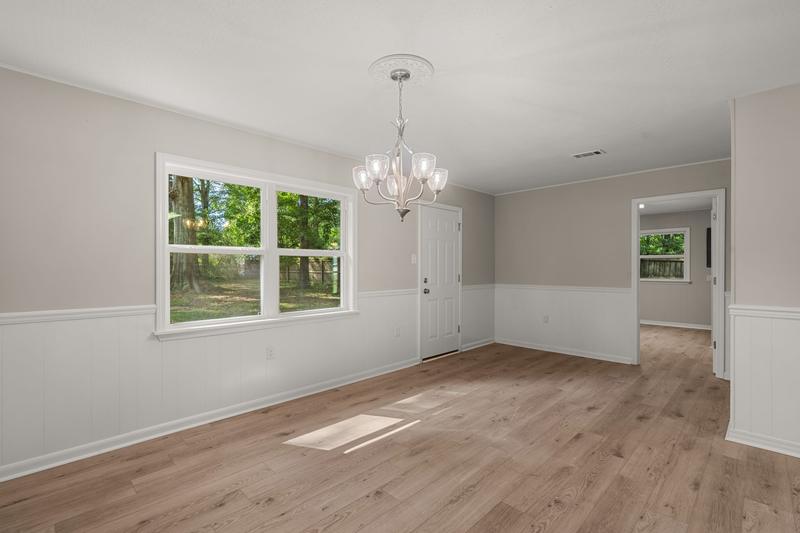 Dining area with chandelier and window, 111 Springhill Drive, Westover, Hattiesburg, MS