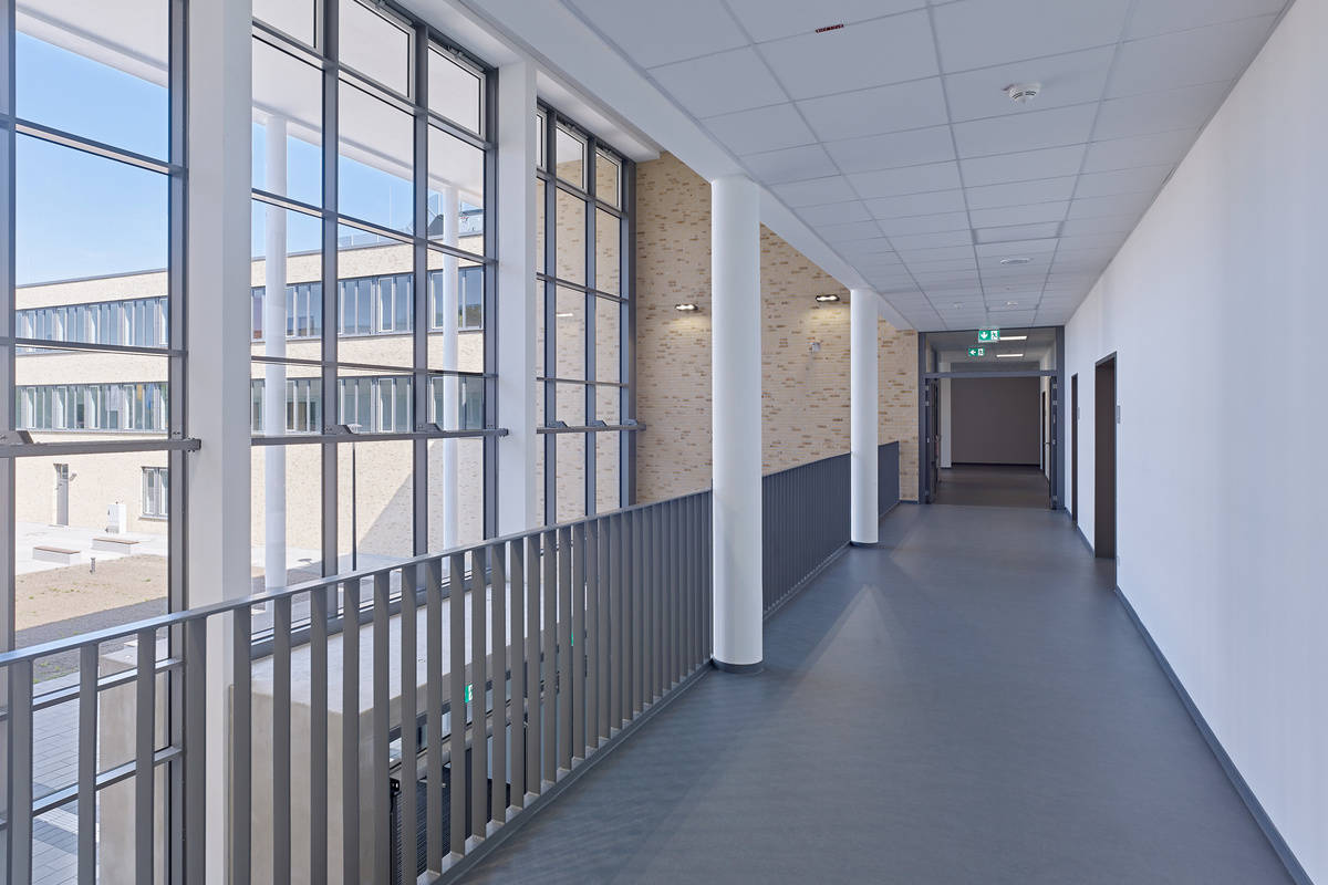 Interior view of the office building reference “Gesamtschule Würselen“ with focus on a corridor