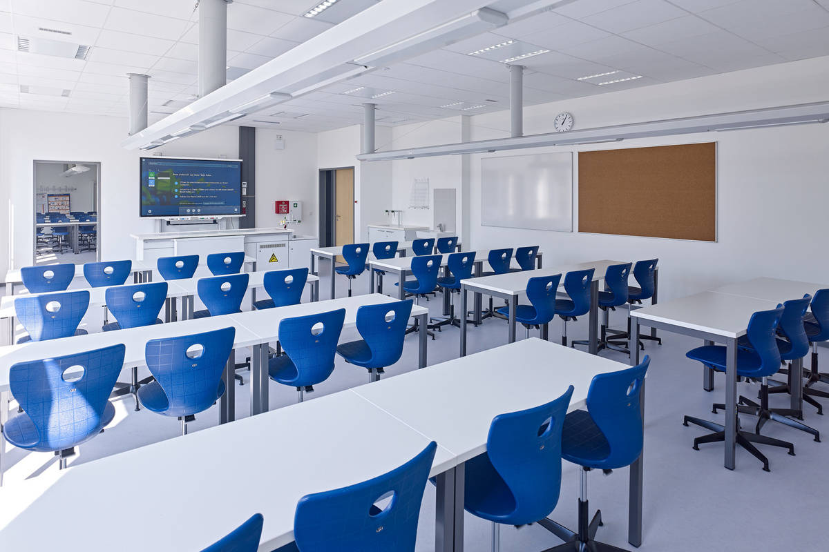 Interior view of the school building reference “Gesamtschule Würselen“ with focus on a classroom