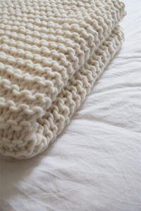 Knit a blanket with garter stitch