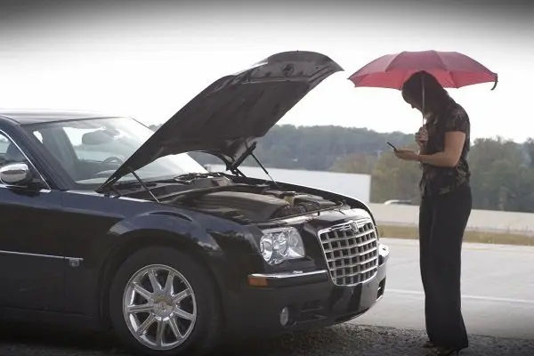 Changing A Car Battery In The Rain