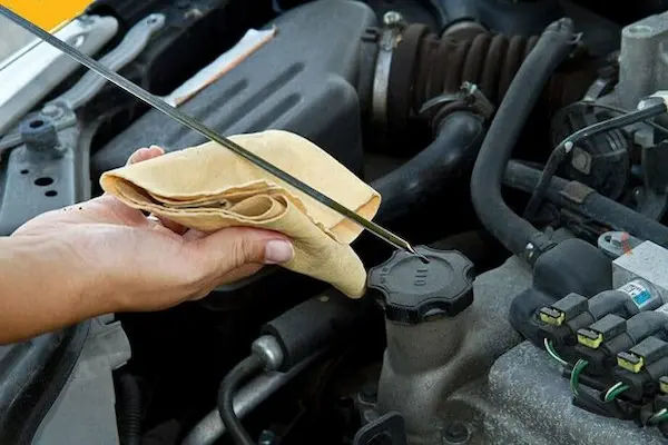 what happens if you put too much oil in your car How To Correct Overfilling
