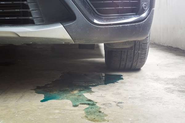why is my car smoking but not overheating Coolant System Leaks