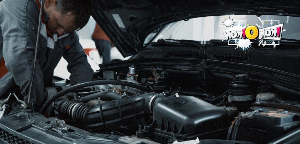 Car Noises Explained: Clicking, Grinding & Rattles Mechanic listening to a car engine