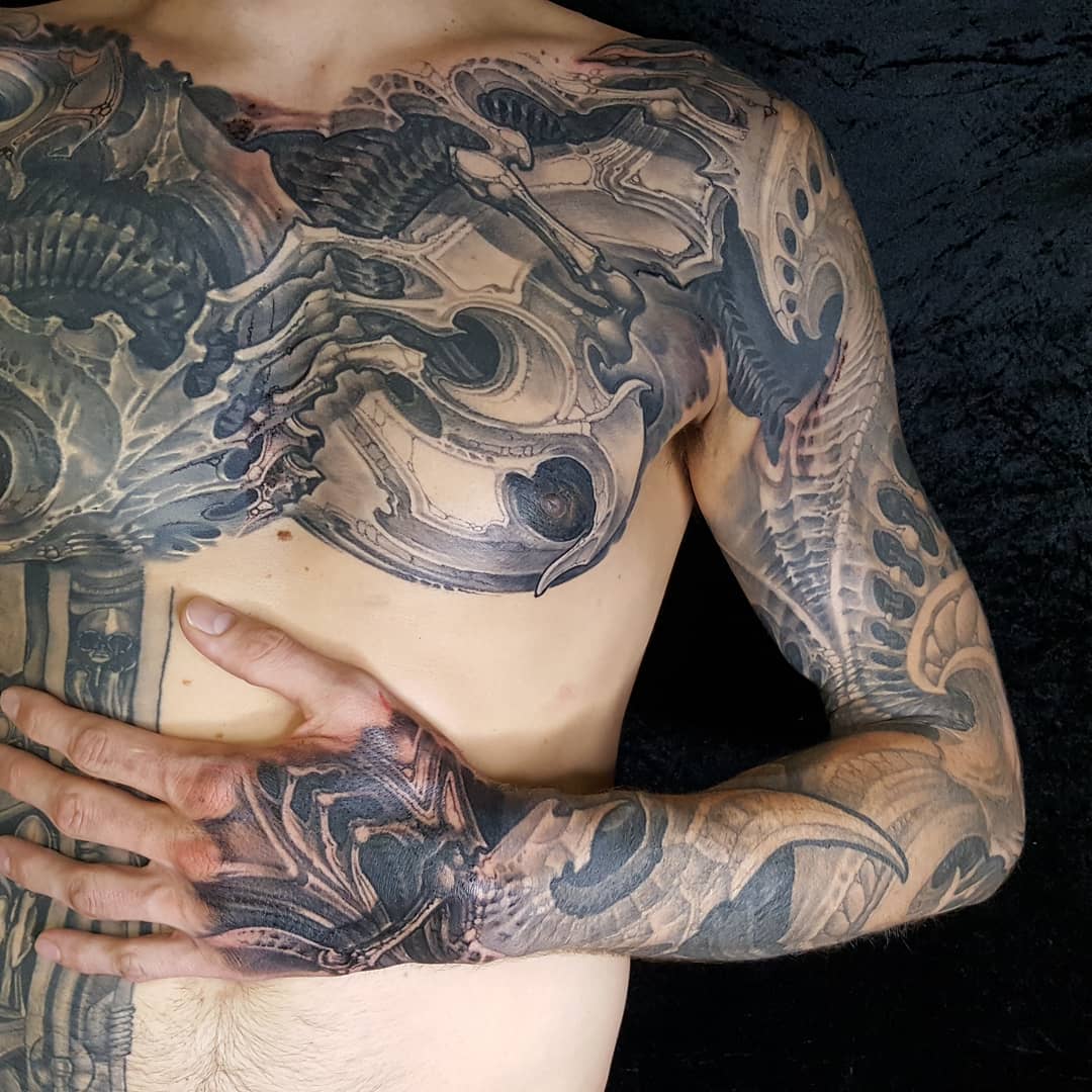 Bio-organic tattoo work by Kali