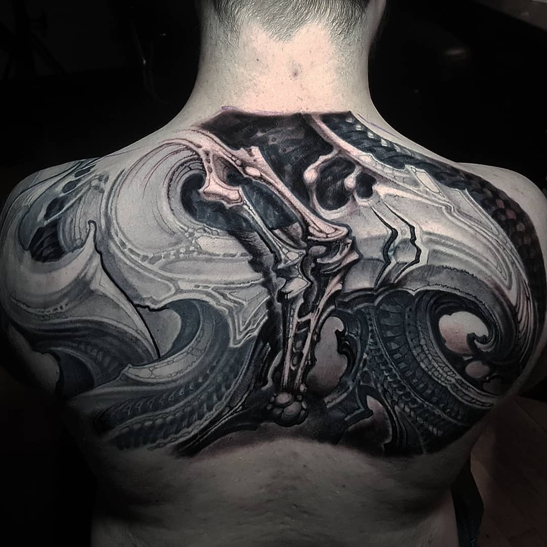 Bio-organic tattoo work by Kali