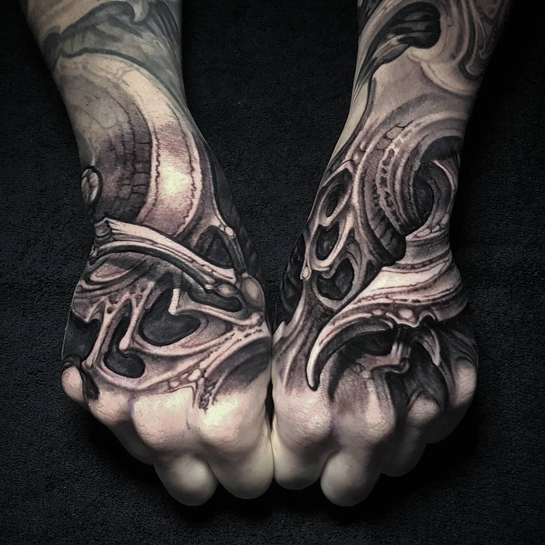Bio-organic tattoo work by Kali