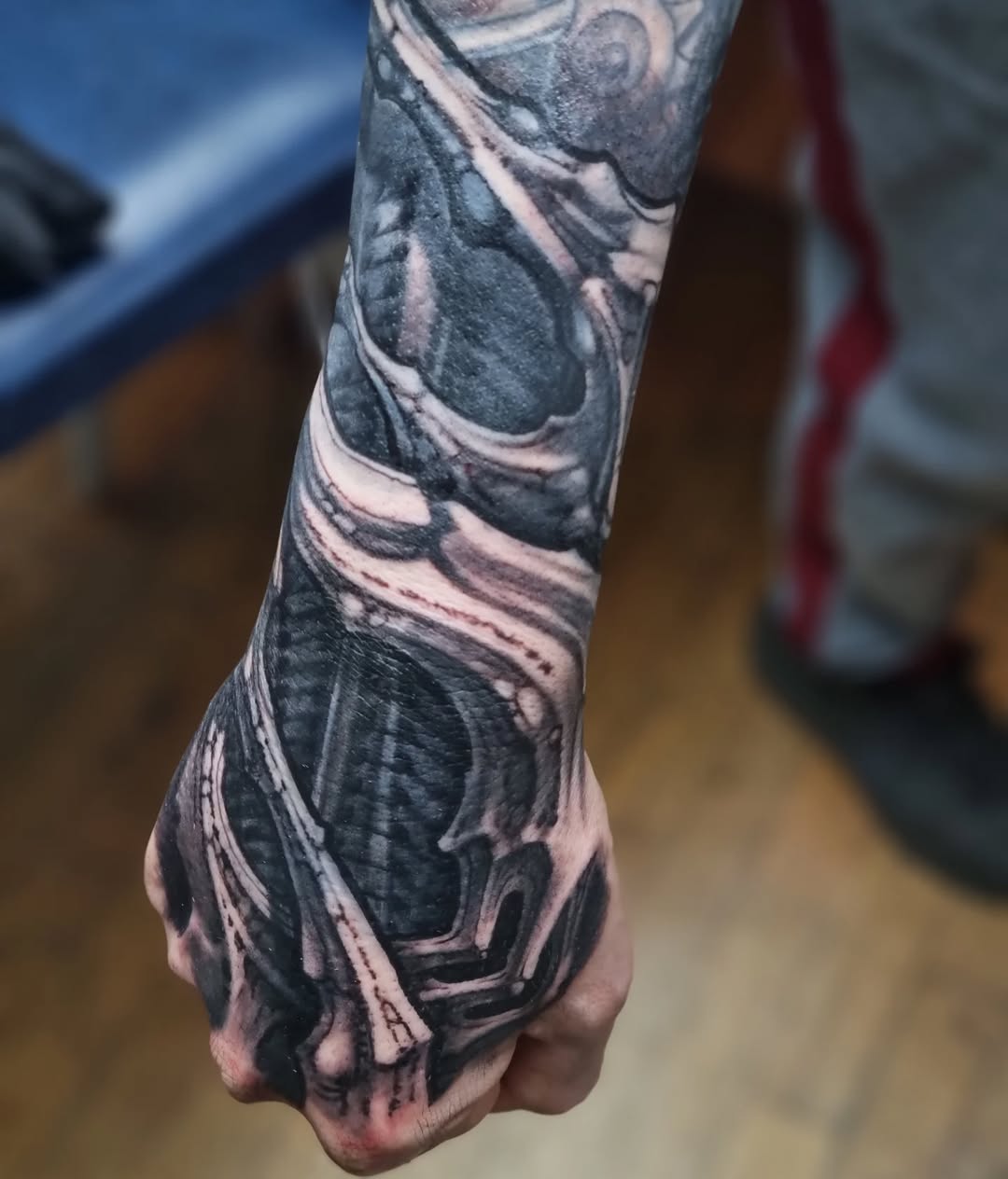 Bio-organic tattoo work by Kali