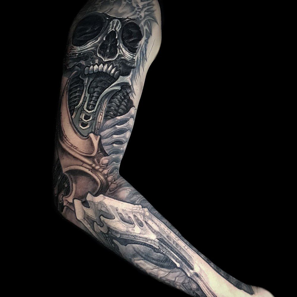 Bio-organic tattoo work by Kali